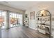 Bright living room with a large sliding glass door leading to an outdoor patio at 1240 Kilmington Ct, Alpharetta, GA 30009