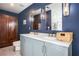 Bathroom featuring a double vanity with marble countertops and dual mirrors at 2075 Six Branches, Roswell, GA 30076