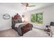 Cozy bedroom features a large window with natural light and a beautifully carved wooden bed frame at 2075 Six Branches, Roswell, GA 30076