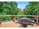 Outdoor deck with furniture, perfect for relaxing or entertaining at 2075 Six Branches, Roswell, GA 30076