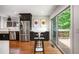 Kitchen with stainless steel refrigerator and access to an outdoor deck at 2075 Six Branches, Roswell, GA 30076