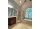 Bathroom featuring shower, soaking tub, tile flooring, and vanity with drawers at 3400 Suwanee Creek Rd, Suwanee, GA 30024