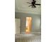Spacious bedroom showcasing plush carpeting and a doorway leading to an ensuite bathroom at 3400 Suwanee Creek Rd, Suwanee, GA 30024