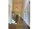 Inviting entryway with hardwood floors, staircase, and bright, open space at 3400 Suwanee Creek Rd, Suwanee, GA 30024