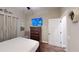 Bedroom featuring a wooden dresser, TV, and hardwood floors at 40 Luther Knight Se Rd, Cartersville, GA 30121