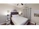 Bedroom with a dark wooden bed frame, hardwood floors, and neutral-toned decor at 40 Luther Knight Se Rd, Cartersville, GA 30121