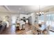 Open kitchen with stainless steel appliances, granite counters, and adjacent dining area with natural light at 40 Luther Knight Se Rd, Cartersville, GA 30121