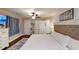 Bright main bedroom with decorative rug, ceiling fan, and hardwood flooring throughout the space at 40 Luther Knight Se Rd, Cartersville, GA 30121