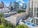 Rooftop pool and ping pong court overlook the city skyline from this condo building at 1421 Peachtree Ne St # 211, Atlanta, GA 30309