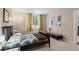Cozy bedroom featuring a comfortable bed with soft bedding, natural light, and simple decor at 1421 Peachtree Ne St # 211, Atlanta, GA 30309