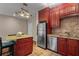 Bright kitchen featuring granite countertops, stainless steel appliances, and convenient breakfast bar at 1421 Peachtree Ne St # 211, Atlanta, GA 30309