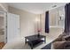 Comfortable living room bathed in natural light with decorative accents and furniture at 1421 Peachtree Ne St # 211, Atlanta, GA 30309
