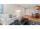 Inviting living room with a sofa, breakfast bar, stylish rug, and ample natural light at 1421 Peachtree Ne St # 211, Atlanta, GA 30309
