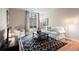 Comfortable living room featuring natural light, modern decor, and cozy seating arrangement at 1421 Peachtree Ne St # 211, Atlanta, GA 30309