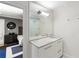 En suite bathroom featuring a marble countertop, drawers, and glass shower door at 2890 Howell Mill Rd, Atlanta, GA 30327