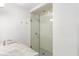 Sleek bathroom featuring a glass-door shower, marble counters, and modern fixtures, creating a luxurious feel at 2890 Howell Mill Rd, Atlanta, GA 30327