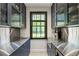 Contemporary butler's pantry with stainless steel countertops and navy cabinetry at 2890 Howell Mill Rd, Atlanta, GA 30327