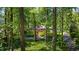 Charming home with mature trees and well-manicured landscaping at 2890 Howell Mill Rd, Atlanta, GA 30327