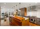 Spacious kitchen with a large island, stainless appliances, and a view to the living room at 2890 Howell Mill Rd, Atlanta, GA 30327