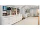 Spacious storage room featuring white cabinets, drawers and carpeted floor at 2890 Howell Mill Rd, Atlanta, GA 30327