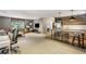 Open concept living room with kitchen island and large window at 2890 Howell Mill Rd, Atlanta, GA 30327