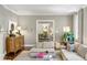 Open-concept living room with view to dining room, neutral tones, and natural light at 2890 Howell Mill Rd, Atlanta, GA 30327