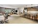 Spacious living room with a kitchen area, offering flexible living with a dining table and plenty of space at 2890 Howell Mill Rd, Atlanta, GA 30327