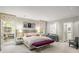 Serene main bedroom featuring a plush bed, stylish decor, and plenty of natural light at 2890 Howell Mill Rd, Atlanta, GA 30327