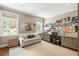 Inviting home office featuring ample workspace, comfortable seating, and lots of natural light at 2890 Howell Mill Rd, Atlanta, GA 30327