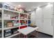 Organized storage room with shelving, cabinets, and ample space at 2890 Howell Mill Rd, Atlanta, GA 30327