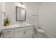 Clean bathroom featuring a vanity with storage, modern fixtures, and a mirror at 383 Grant Se Cir # 1634, Atlanta, GA 30315