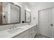 Bright bathroom with double vanity, white cabinets, modern fixtures, and designer tile floor at 383 Grant Se Cir # 1634, Atlanta, GA 30315