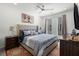 Comfortable main bedroom with plush bedding, ceiling fan, bright windows, and stylish decor at 383 Grant Se Cir # 1634, Atlanta, GA 30315