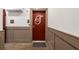 Condo entrance with neutral color and trim and monogrammed red door at 383 Grant Se Cir # 1634, Atlanta, GA 30315