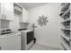 Functional laundry room with modern washer and dryer and ample storage space at 383 Grant Se Cir # 1634, Atlanta, GA 30315