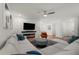 Comfortable living room showcasing a modern fireplace, large sofa, and stylish decor at 383 Grant Se Cir # 1634, Atlanta, GA 30315