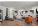Bright living room featuring contemporary furniture, hardwood floors, and abundant natural light at 383 Grant Se Cir # 1634, Atlanta, GA 30315