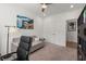 Comfortable home office with a couch, workspace, and lots of natural light at 383 Grant Se Cir # 1634, Atlanta, GA 30315