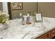 Bathroom with marble countertop and decor at 690 Sienna Dr, Cumming, GA 30040