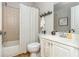 Cozy bathroom features tile shower and flooring, stylish vanity and decorative fixtures at 690 Sienna Dr, Cumming, GA 30040