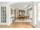 Bright dining room featuring an elegant hutch and open concept layout at 690 Sienna Dr, Cumming, GA 30040
