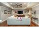 Spacious living area offering a large screen television and lots of space for entertaining at 690 Sienna Dr, Cumming, GA 30040