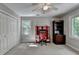 Bedroom featuring a closet and a built in desk next to the window at 1595 Northcliff Trce, Roswell, GA 30076