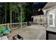 Well-maintained wooden deck featuring stylish furniture and a cozy, screened-in porch, ideal for outdoor entertaining at 1595 Northcliff Trce, Roswell, GA 30076