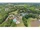 Aerial view of the community with pools, tennis courts, playground and pond at 1721 Mulberry Lake Dr, Dacula, GA 30019