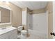 Bathroom featuring a white vanity, a toilet, and a tub/shower with white tile surround at 1721 Mulberry Lake Dr, Dacula, GA 30019