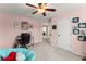 Bedroom with unique design with desk area and ample wall decor at 1721 Mulberry Lake Dr, Dacula, GA 30019