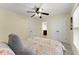 Bedroom with double closet, natural light, and neutral carpeting at 1721 Mulberry Lake Dr, Dacula, GA 30019