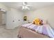 Spacious bedroom with ample closet space, soft carpeting, and neutral color scheme at 1721 Mulberry Lake Dr, Dacula, GA 30019