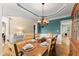 Elegant dining room featuring hardwood floors and a beautiful chandelier at 1721 Mulberry Lake Dr, Dacula, GA 30019